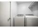 Bright laundry room with a modern Samsung washer and dryer at 826 Addison Ne Dr, St Petersburg, FL 33716