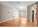 Bright living room with neutral paint, hardwood floors, and an open layout at 826 Addison Ne Dr, St Petersburg, FL 33716