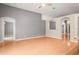 Open-concept living room featuring arched doorways and abundant natural light at 826 Addison Ne Dr, St Petersburg, FL 33716