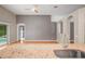 Spacious living area featuring arched doorways, recessed lighting, and wood flooring at 826 Addison Ne Dr, St Petersburg, FL 33716