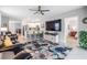 Spacious living room leads to the kitchen and dining area, creating an open and inviting space at 8310 Hardy Bay Loop, Wesley Chapel, FL 33545