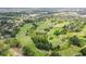 Panoramic aerial view of the golf course and residential area, showcasing lush landscapes and scenic views at 8499 101St Ave, Seminole, FL 33777