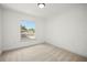Bright, carpeted bedroom offers lots of natural light at 8499 101St Ave, Seminole, FL 33777