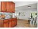 Spacious kitchen with dark wood cabinets and an open floor plan at 8499 101St Ave, Seminole, FL 33777