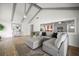 Spacious living room offers wood floors, lots of natural light, and open floor plan at 8499 101St Ave, Seminole, FL 33777