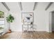 Bright living room with wood floors and art adds elegance at 8499 101St Ave, Seminole, FL 33777
