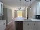 Open-concept kitchen with stainless steel appliances and sleek countertops at 904 Grand Canyon Dr, Valrico, FL 33594