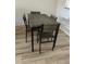 Dining area with wooden table and chairs, perfect for Gathering meals and entertaining at 13829 Mission Oaks Blvd, Seminole, FL 33776