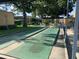 Community shuffleboard courts perfect for friendly competition and outdoor enjoyment at 13829 Mission Oaks Blvd, Seminole, FL 33776
