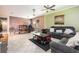 Inviting living room features tile floors, modern decor, and comfortable seating at 11711 Winterset Cove Dr, Riverview, FL 33579