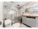 Stylish bathroom with a glass walk-in shower and modern fixtures at 120 Crestwood Ln, Largo, FL 33770