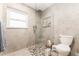 Contemporary bathroom with a mosaic-tiled shower and modern fixtures at 120 Crestwood Ln, Largo, FL 33770