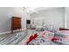 Large bedroom featuring high ceilings, themed decor and multiple seating areas at 120 Crestwood Ln, Largo, FL 33770