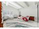 Bright, spacious bedroom with a vaulted ceiling and whimsical decor at 120 Crestwood Ln, Largo, FL 33770