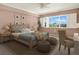 Cozy bedroom with natural light, a queen-sized bed, and neutral decor at 1200 N Shore Ne Dr # 404, St Petersburg, FL 33701
