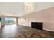 Spacious living room area with sliding glass doors to a balcony and beautiful water views at 1200 N Shore Ne Dr # 404, St Petersburg, FL 33701