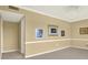This living room features carpet and neutral wall colors with decorative wall art at 1200 N Shore Ne Dr # 404, St Petersburg, FL 33701