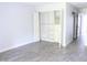 Bedroom with tiled flooring and a closet at 1200 Tarpon Woods Blvd # M6, Palm Harbor, FL 34685