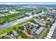Scenic aerial view of the community showcasing the waterfront and the nearby golf course at 1206 10Th Se Cir, Largo, FL 33771