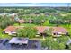 Enjoy this property's lush landscaping and convenient covered parking at 1206 10Th Se Cir, Largo, FL 33771