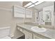 This bathroom features a sink, mirror, and drawers at 1206 10Th Se Cir, Largo, FL 33771