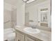Bathroom with tile shower, bathtub, sink, and drawers at 1206 10Th Se Cir, Largo, FL 33771