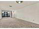 Relax in this open living room with sliding glass door access to the lanai at 1206 10Th Se Cir, Largo, FL 33771