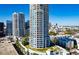Stunning aerial view of luxury condos with city skyline in the background at 1209 E Cumberland Ave # 1003, Tampa, FL 33602