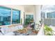 Large balcony with seating and city views with plants and white railing at 1209 E Cumberland Ave # 1003, Tampa, FL 33602