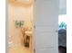 Half-bath with pedestal sink, light neutral walls, and decorative accents at 1209 E Cumberland Ave # 1003, Tampa, FL 33602