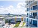 Condo building with balconies overlooking the cityscape and harbor at 1209 E Cumberland Ave # 1003, Tampa, FL 33602