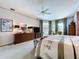 Spacious primary bedroom features carpet floors, neutral paint, and large windows for natural light at 1218 Willow Bend Way, Lutz, FL 33549