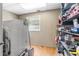 Functional laundry room with ample storage space and appliances for added convenience at 1226 E Henry Ave, Tampa, FL 33604