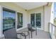 This beautiful balcony offers comfortable seating and plenty of space for relaxing at 125 Belleview Boulevard # 203, Belleair, FL 33756