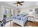 Bedroom with balcony access and outdoor seating at 125 Belleview Boulevard # 203, Belleair, FL 33756