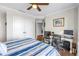 Bedroom with desk, office chair and closet at 125 Belleview Boulevard # 203, Belleair, FL 33756