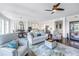 Bright, spacious living area with hardwood flooring and combined dining and kitchen, perfect for modern living at 125 Belleview Boulevard # 203, Belleair, FL 33756