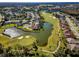 Beautiful aerial view of the community with golf course, lakes and lush landscaping at 1338 Winding Willow Dr, Trinity, FL 34655