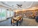 Inviting library with shelves of books, comfortable seating, and a peaceful reading environment at 1338 Winding Willow Dr, Trinity, FL 34655