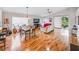 Spacious open-concept living room with hardwood floors, and direct patio access at 1338 Winding Willow Dr, Trinity, FL 34655