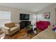 Cozy living room features warm lighting, hardwood floors, and comfortable seating at 1338 Winding Willow Dr, Trinity, FL 34655