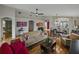 Open floor plan showcases living room with hardwood floors and comfortable seating at 1338 Winding Willow Dr, Trinity, FL 34655