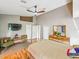 Spacious primary bedroom includes hardwood floors, natural light, and modern furnishings at 1338 Winding Willow Dr, Trinity, FL 34655