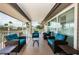 Relaxing outdoor lounge area with comfortable wicker chairs and scenic views at 1338 Winding Willow Dr, Trinity, FL 34655
