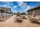 Poolside patio with lounge chairs, tables, and umbrellas, perfect for enjoying sunny days by the pool at 1338 Winding Willow Dr, Trinity, FL 34655