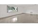 A spacious living area with a large window at 13795 Antigua Dr, Seminole, FL 33776