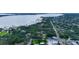 Scenic aerial showing the home's location near the water and lush green surroundings at 1414 75Th Nw St, Bradenton, FL 34209