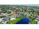 Aerial view showing the home's proximity to the lake and neighborhood amenities at 1414 75Th Nw St, Bradenton, FL 34209