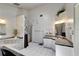 Bright bathroom showcasing a sunken tub, shower, and large vanity with storage at 1414 75Th Nw St, Bradenton, FL 34209