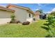 Exterior home view with a tile roof and screened-in lanai at 1414 75Th Nw St, Bradenton, FL 34209